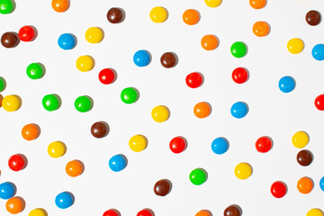 Colourful candy background, copy space. White background. Minimal coloured concept.