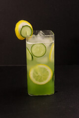 A Glass Of Cucumber Lemonade With Slices Lemon And Slices Cucumber.