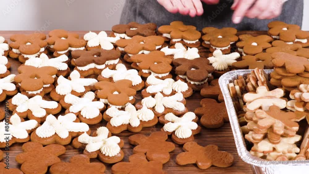 Poster making festive gingerbread sandwiches on rustic wooden table