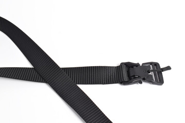 Black mens nylon fastening belt isolated on white background. Men's outdoor military tactical belt.