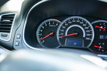 Closeup of a speedometer in a modern car, shallow depth of field