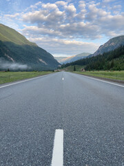 highway in mountains under cloudy sky, Russia, Siberia, Altai mountains