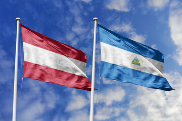 3d illustration. Austria and Nicaragua Flag waving in sky. High detailed waving flag. 3D render. Waving in sky. Flags fluttered in the cloudy sky.