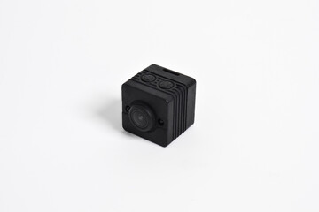 Closeup spy camera isolated on white background. Black security camera, Mini spy camera