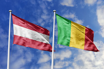 3d illustration. Austria and Mali Flag waving in sky. High detailed waving flag. 3D render. Waving in sky. Flags fluttered in the cloudy sky.