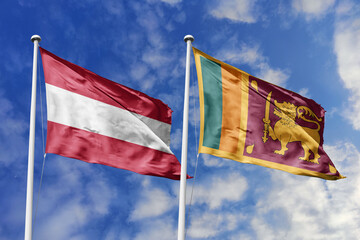 3d illustration. Austria and Sri Lanka Flag waving in sky. High detailed waving flag. 3D render. Waving in sky. Flags fluttered in the cloudy sky.
