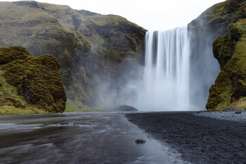 Skogafoss, big famous waterfall in South Iceland in moody weather
