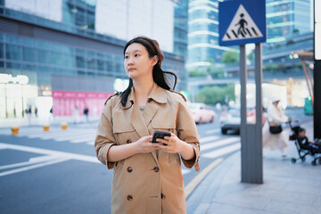 Professional Woman Navigating the Urban Streets