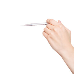 Female hand holds a syringe.
