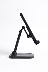 Phone holder stand that can be adjusted to height angle isolated on white background. holder for phone, phone stand, mount, universal