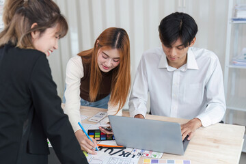 Close up ux developer and ui designer brainstorming interface wireframe design.Creative digital...