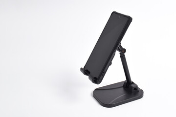 Phone holder stand that can be adjusted to height angle isolated on white background. holder for phone, phone stand, mount, universal