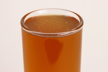 Fresh honey. Glass of natural honeycomb