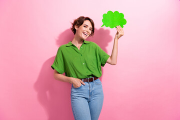 Photo portrait of pretty young girl hold paper cloud dressed stylish green outfit isolated on pink...
