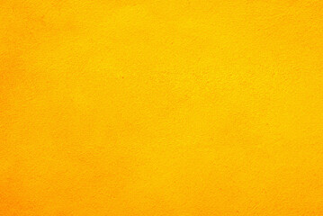Vibrant Yellow Cement Wall Texture Background for Design Projects