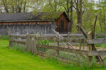 Old fashion farm house, copy space, spring bloom, rainy day.