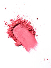 Swatch or swoosh of red makeup powder texture. Bold smear or sample of cosmetic product. Macro...