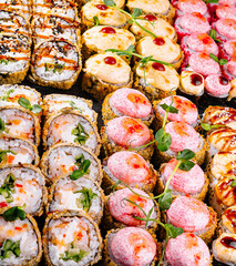 Assorted sushi platter close up background