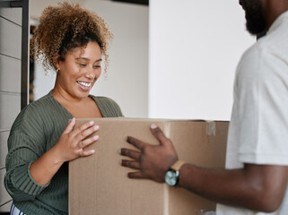 Box, shipping and woman with deliveryman by door for ecommerce package at home complex. Cargo, logistics and male courier with happy female customer for cardboard parcel at house for online order.