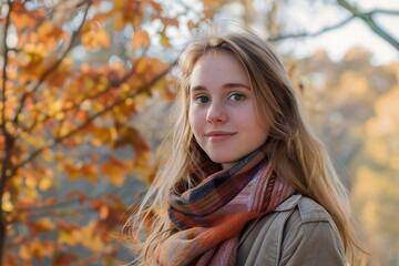 Naklejka premium Young Caucasian Woman Poses in Autumn Foliage Web Banner Design