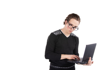 Young attractive student posing on a white background. Work and study.