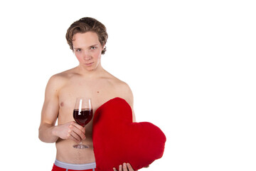 A young attractive guy in the role of Cupid with gifts. Valentine's Day.