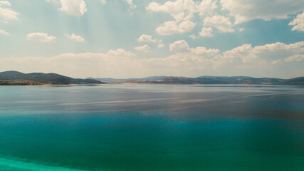 Magnificent nature view combined with the turquoise water of Salda Lake and magnificent clouds. Burdur, Turkey.