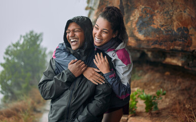 Hiking, hug and laughing with couple on mountain outdoor for adventure, journey or love in nature....