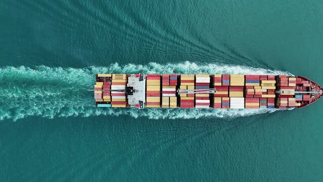 Express Cargo Container Ship with contrail in the ocean ship carrying container and running for export concept technology freight shipping by ship forwarder mast