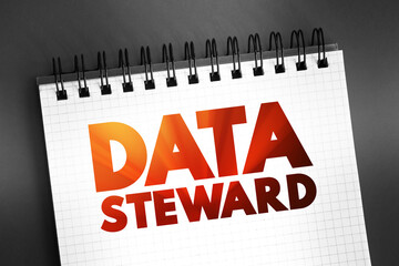 Data steward - oversight or data governance role within an organization, text concept on notepad...