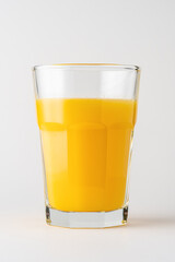 Glass of orange juice on white background. Fruit concept.