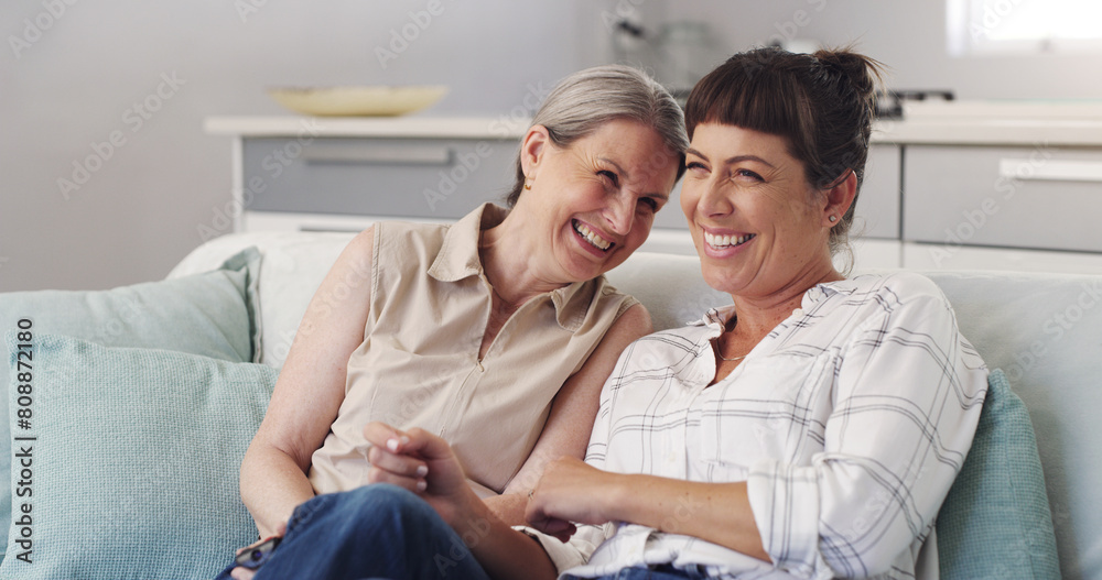 Wall mural Senior mom, woman and laughing together in family home for love, care and support in apartment. Female people, daughter and smile for mothers day in house with happiness, comedy and funny in lounge