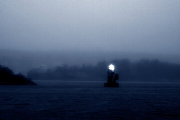lighthouse morning in the fog