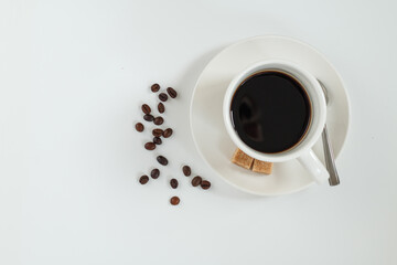 A cup of black coffee on a white background.
