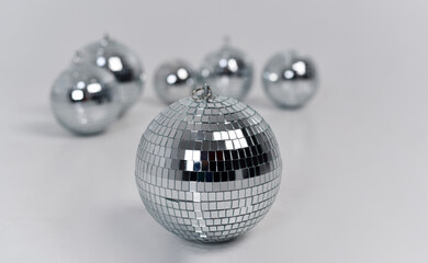 Mirror glitter balls on white background