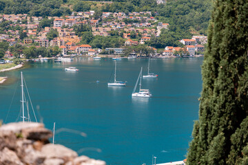 Panoramic view from above of bay with boats. Summer holidays at Mediterranean resort. View from the...