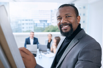 Black man, portrait or business meeting writing on whiteboard for presentation or collaboration in...
