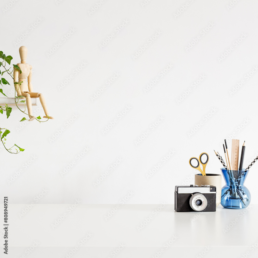 Canvas Prints Home office desk with vintage camera. Creative workspace. Mock up.	
