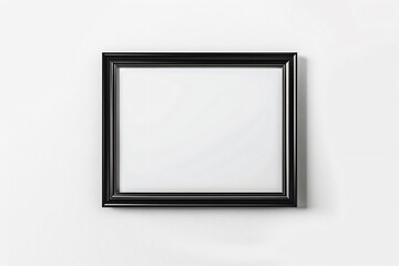 a black picture frame on a white wall