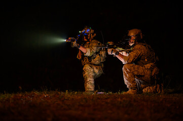Soldiers in Military Operation at night in soldiers training