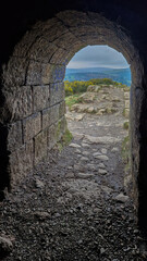Fototapeta premium The entrance leading into Flue Chimney beckons visitors to step into history's industrial marvels.