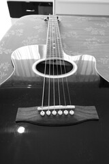 Black And White Close Up Photo Of A Guitar