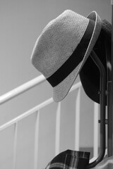 Black And White Photo A Fedora Hat Hanged At The Hanger