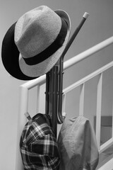 Black And White Photo A Fedora Hat Hanged At The Hanger