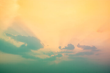 Beautiful , luxury soft gradient orange gold pastel clouds and sunlight on the blue sky perfect for...