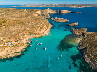 Drone aerial view of popular Blue lagoon on Comino island. Mediterranean sea, Malta 