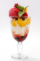Ice cream with fruits in glass. Melba