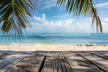 Empty wooden table background with copy space with the tropical view of palms