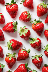 Pattern of Fresh Juicy Strawberries Arranged on White Surface with Background of Freshness