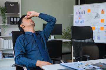 Businessman eyestrain fatigued from computer work, stressed women suffer from headache bad vision sight problem sit at office table using computer.